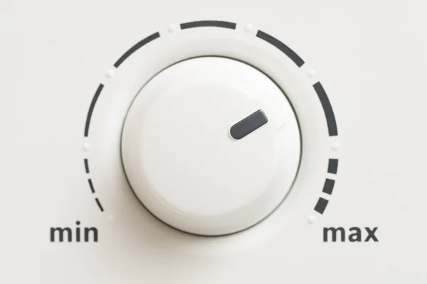 Macro Shot of a Minimum Maximum Level Control Knob — Stock Photo, Image