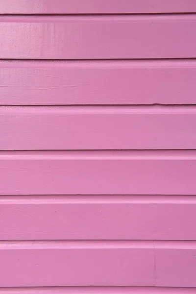 Superfície de painel de madeira rosa pintada para fundos — Fotografia de Stock