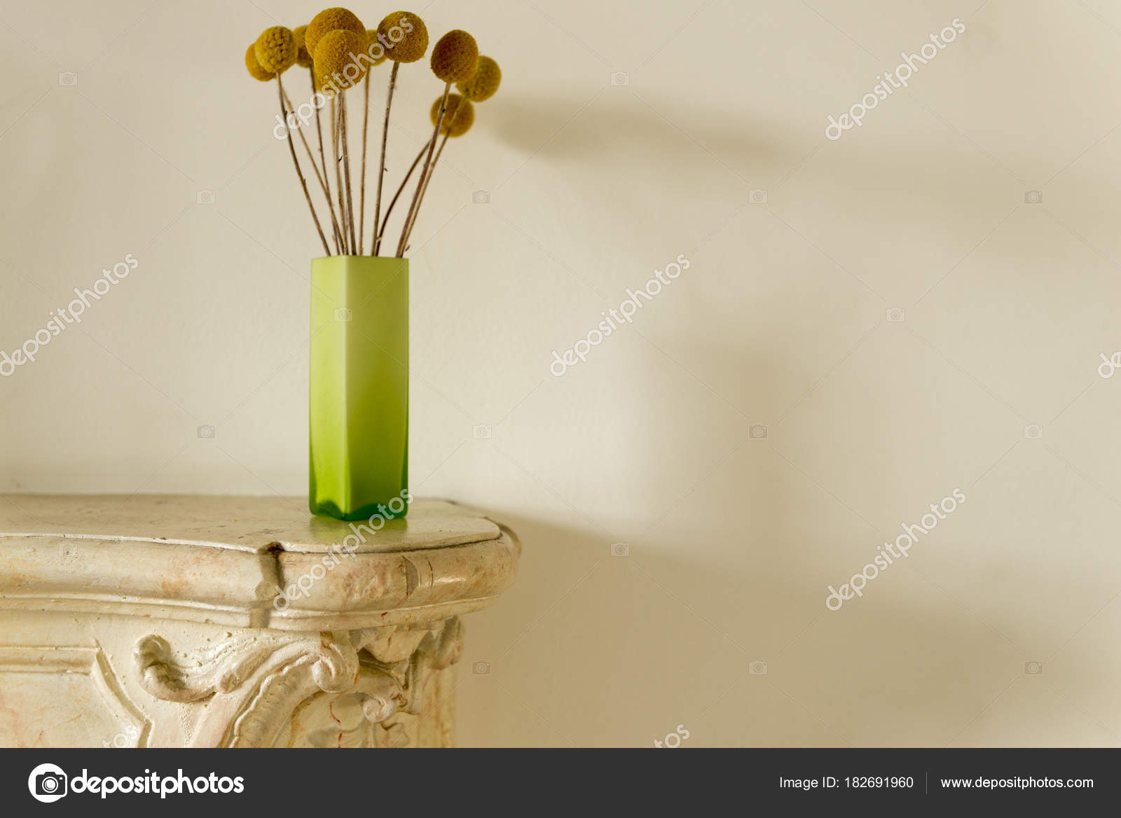 Dried Globosas In Vase On Marble Foyer Table With Copy Space