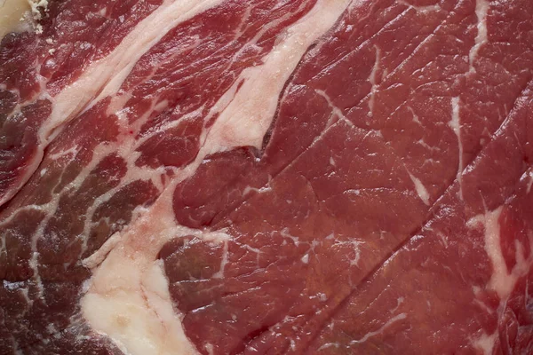 Makroaufnahme Der Oberfläche Von Rohem Rindfleisch Oder Fleisch Als Hintergrund — Stockfoto