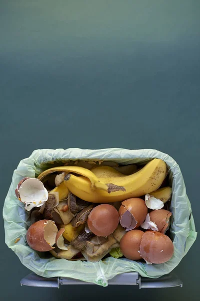 Garbage Bin Filled Organic Kitchen Waste Overhead View Isolated Blue — Stock Photo, Image