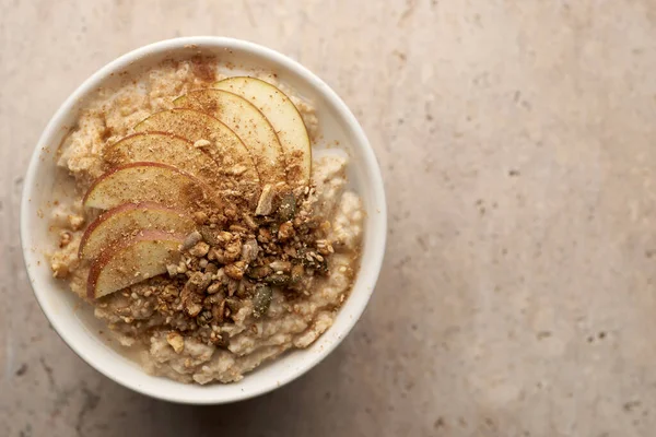Overhead Closeup Bowl Oatmeal Porridge Topped Apple Slices Cinnamon Granola Stock Picture