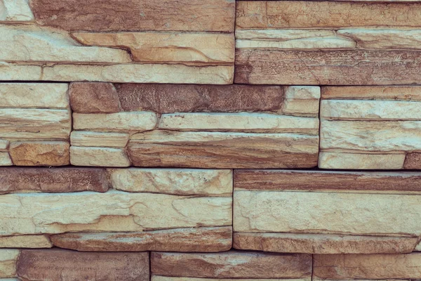 Textur der groben grauen Steinmauer — Stockfoto
