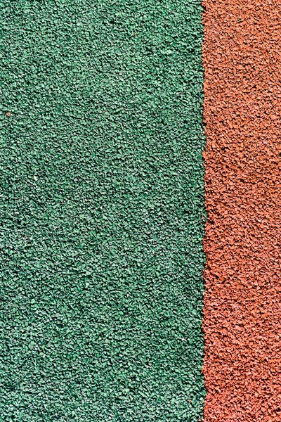 Цветное покрытие игровой площадки — стоковое фото