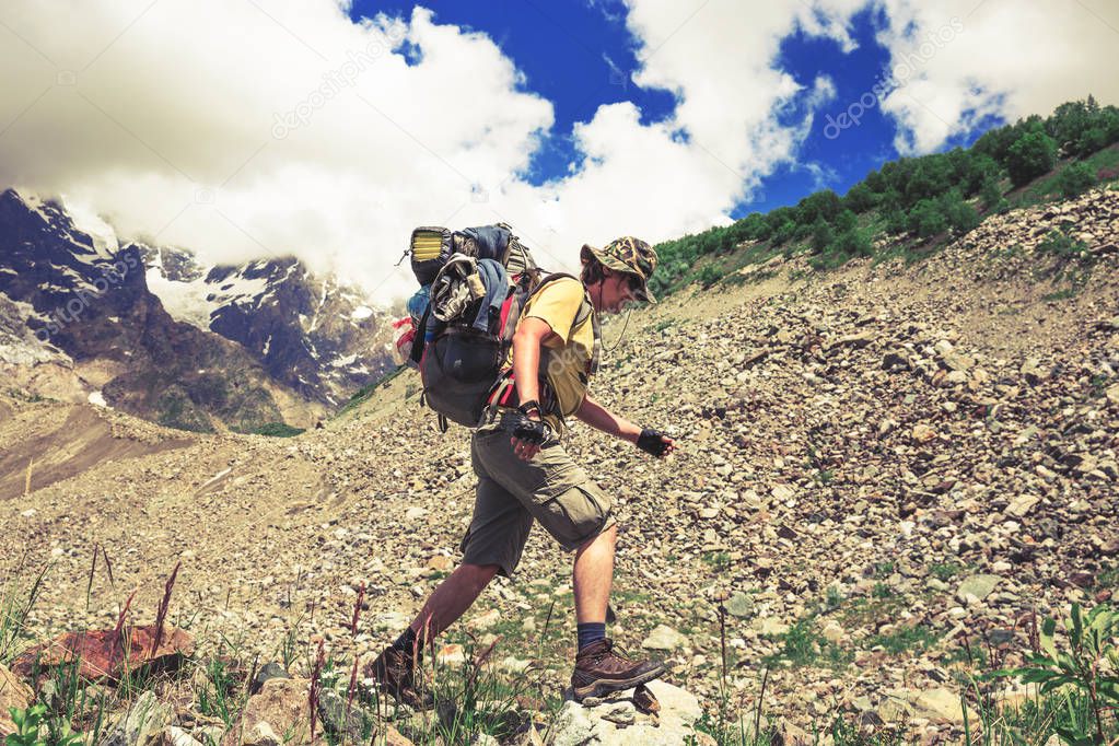 Happy hiker enjoy beautiful mountains. Relax summer time