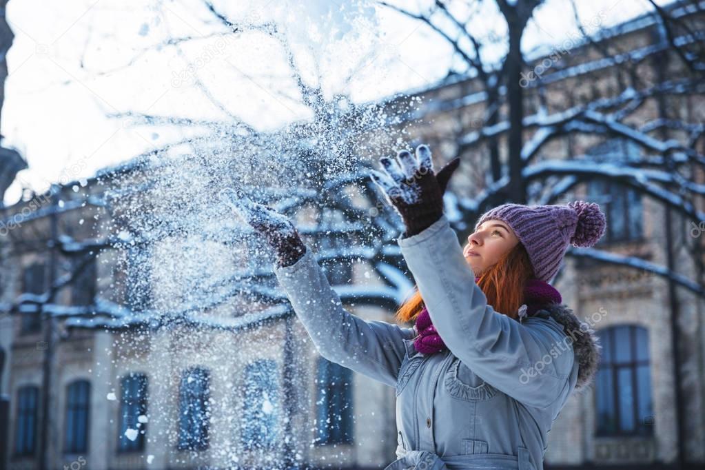 Young woman in winter park