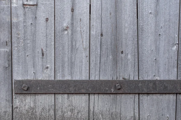 Fragment stare drewniane drzwi — Zdjęcie stockowe