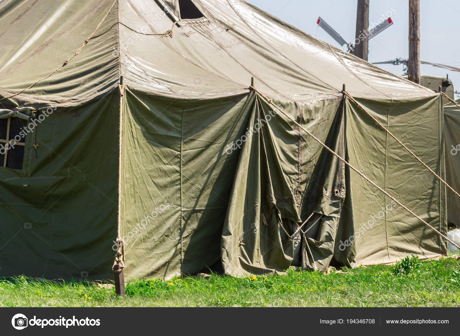Detail with the exterior of a green military tent — Stock Photo © ostser7  #194346708