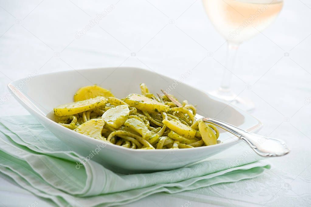 Linguine pasta with pesto genovese and potatoes