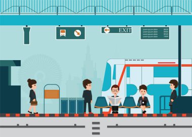 İnsanlar bir trenin tren istasyonu platformu beklerdim.