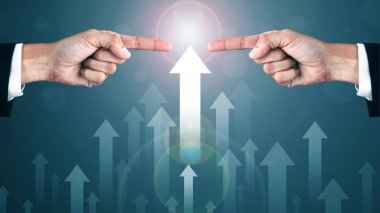 Two Pointing hand of Men fighting with Arrow Visual Graphic on Light of Len flare and Bokeh blue background. COPY SPACE. Market Uptrend.