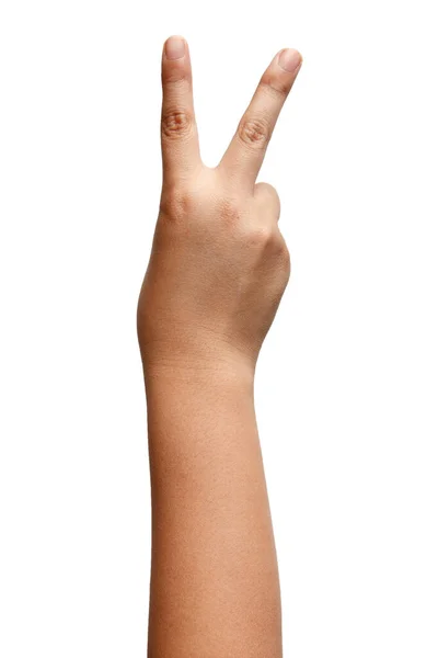 白い背景の上に孤立した少年アジア人の手のジェスチャー 2本の指の勝利サイン 銃のシンボル — ストック写真