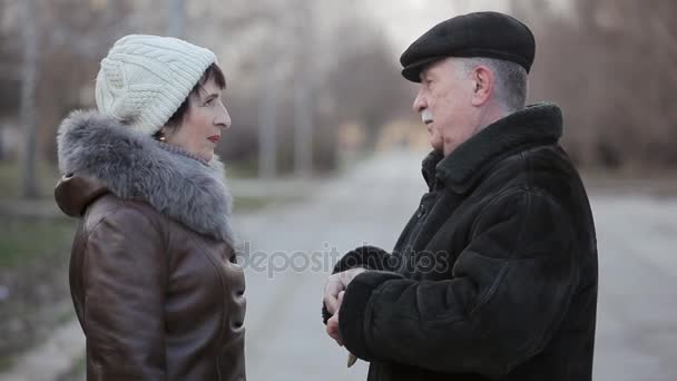 Cheery Middle Aged Woman Speaks Her Senior Husband Laughs Winter — Stock Video