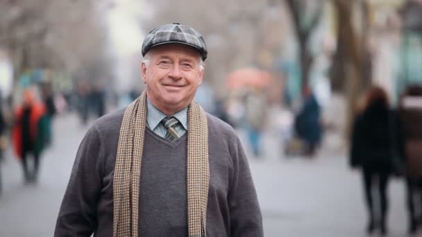 Happy Old Man Dark Sweater Scarf Stands Smiles Park Alley — Stock Video