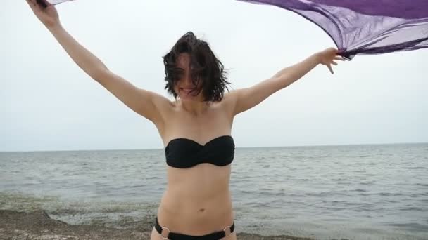 Smiling Woman Black Bikini Keeps Her Hand Fluttering Pareo Slo — Stock Video