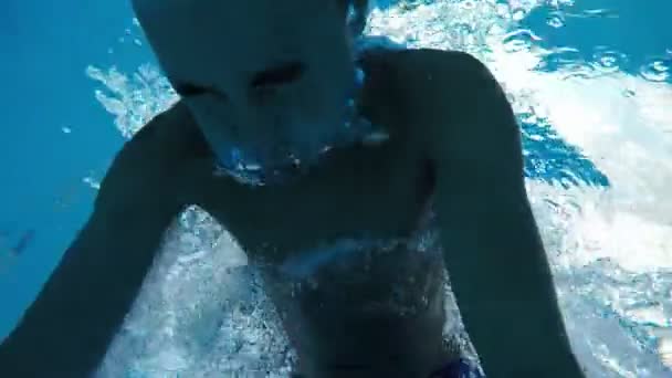 Happy Boy Doing Somersault Underwater Many Bubles Pool Slo Originele — Stockvideo