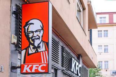 PRAGUE, CZECH REPUBLIC - MAY 2017: KFC fast food signage. KFC is an american fast food company that specializes in chicken clipart