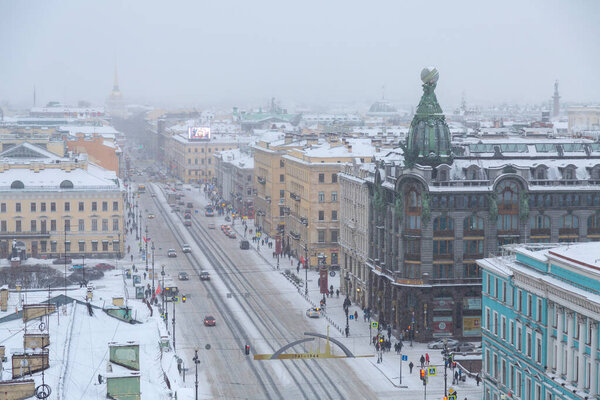 ST. PETERSBURG, RUSSIA - JANUARY, 2019: snowy weather in St. Petersburg, Christmas city, snowfall, view from the Duma Tower on Nevsky Prospect, Zinger House.