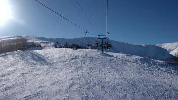 Lifting on the Chair Lift Views of Snow Landscape Background Winter Sport Recreations Ski Skiing Resort Wild Mountains Lifestyle — Stock Video