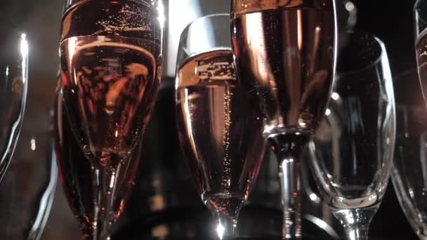 A lot of glasses with champagne with sparkling wine at the Banquet — Stock Video