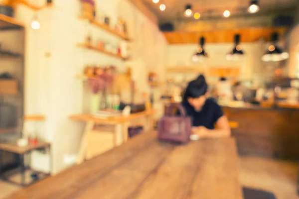 Coffee shop blur background with bokeh of lamplight, Blur scene.