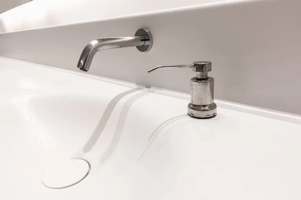 Modern faucet and sink in restroom. — Stock Photo, Image