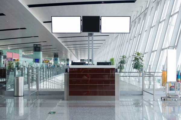 Boarding pass and gate counter in terminal airport