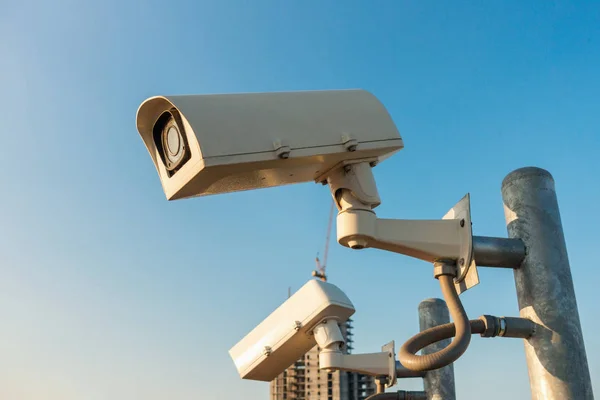 CCTV camera monitoring traffic on the street