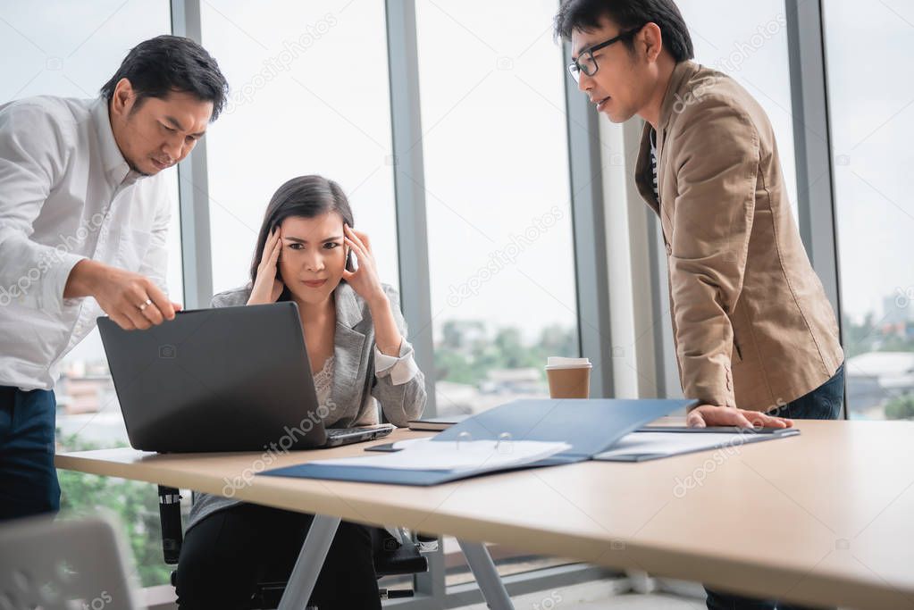 Businesspeople Teamwork are Seriously During Meeting Together, Business Woman Having Upset While Looking Result of Business Profit. Management Leader is Dissatisfied About Project Their Team Execution