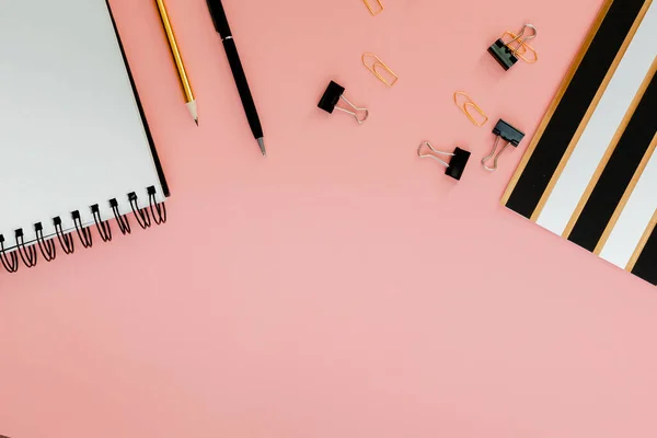 Mockup planner flat lay, top horizontal view pink background. Notepad and notebooks with stationary. Golden, white, pink and black colors — Stock Photo, Image