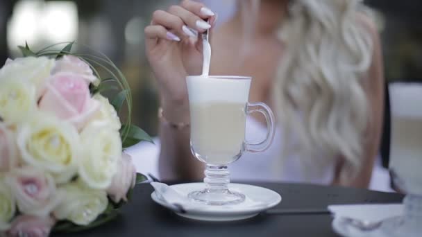 Blonde girl with latte — Αρχείο Βίντεο