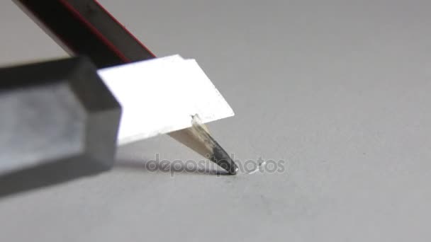 Close-up blade sharpens pencil — Stock Video