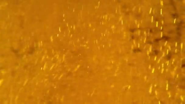 Macro plan de bière avec bulles 