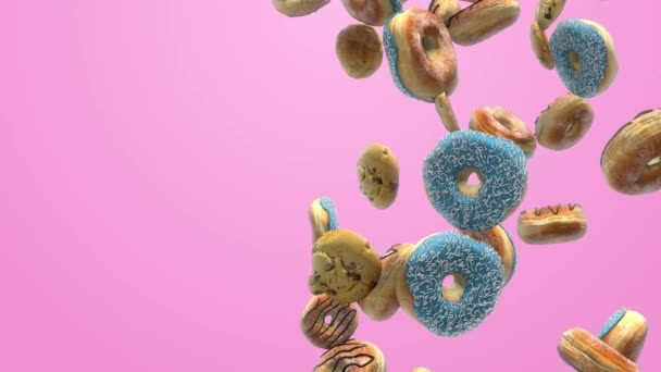 Donuts diferentes sobre un fondo rosa — Vídeo de stock