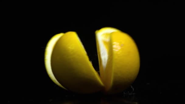 Slicing Orange in Slow Motion — Stock Video