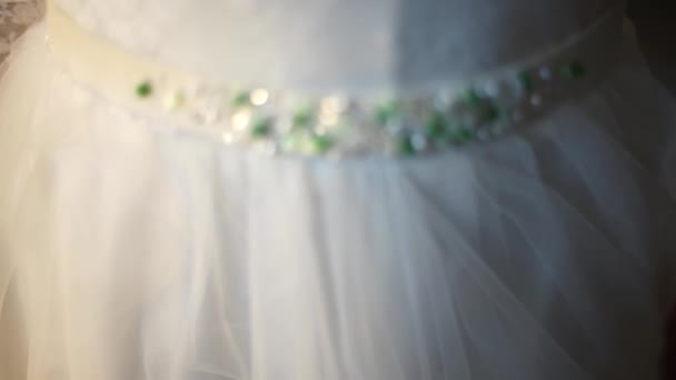 Very beautiful belt on a wedding dress made of crystals. — Stock Video