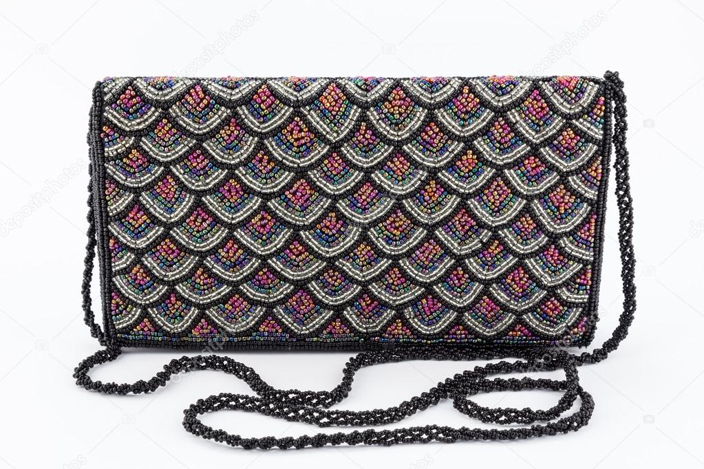 Female evening clutch embroidered with black, silver and red bead