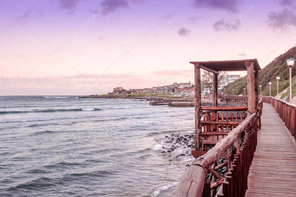 Gonubie beach boardwalk at sunset. Beautiful seascape background