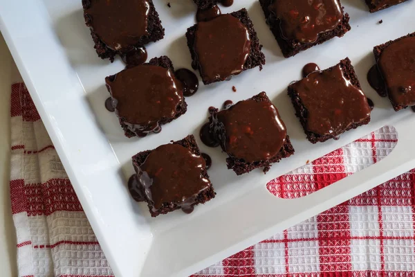 Chocolate brownies covered with chocolate nut ganache - Close up — Stock Photo, Image