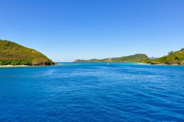 Passing near Naviti Island, Fiji clipart