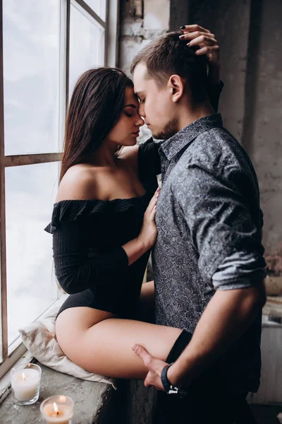 Guy Gently Hugs Girl Window — Stock Photo, Image