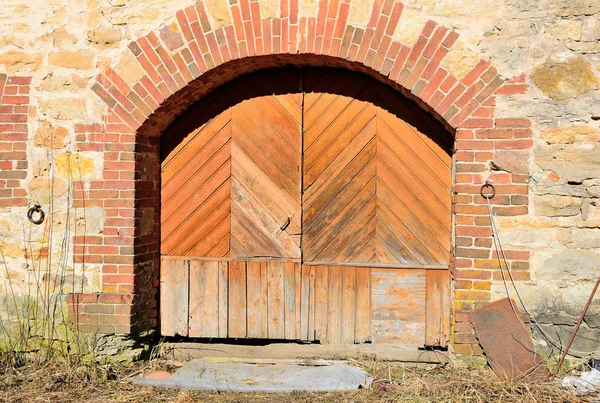 Drevyanye old brick arch gates