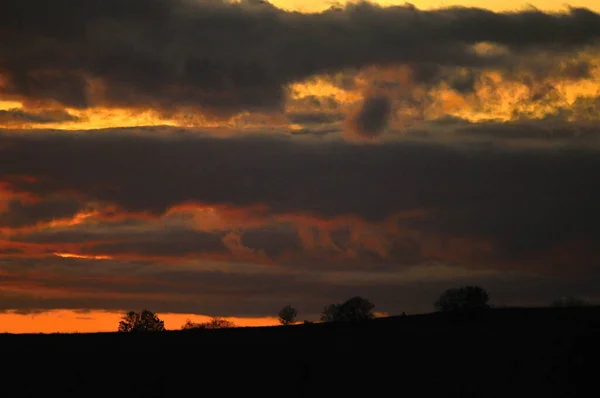 red clouds illuminated by the sun