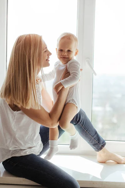Portrait Smiling Young Cute Mother Her Son Playing Window Bright — Stock Photo, Image