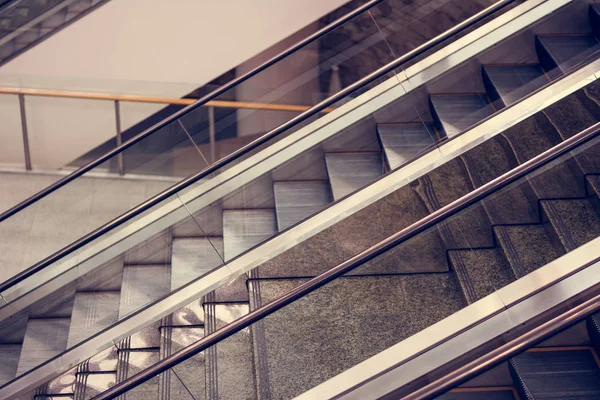 Modern escalator in shopping mall tone vintage — Stock Photo, Image