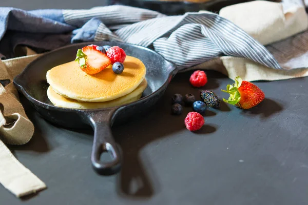 Pancakes with blueberries  & raspberry on wood background — Stock Photo, Image