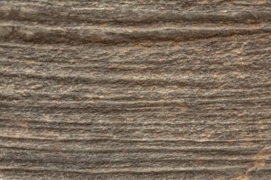 Yıpranmış eski bir parçanın çizgileri ve dokusunda makro görünüm