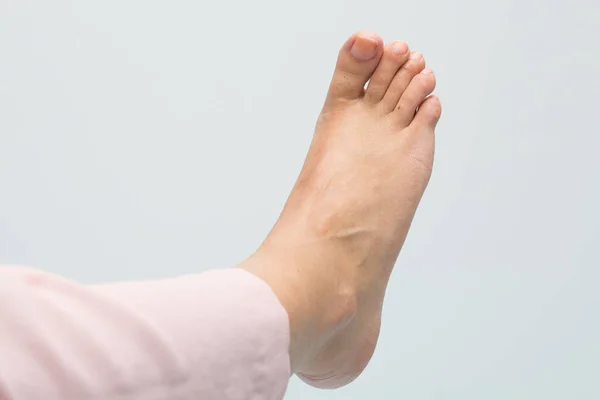 Closeup of adult foot of woman