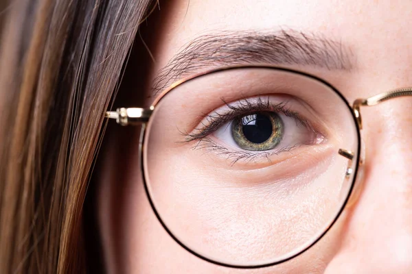 Attractive Young Caucasian Lady Stares Lens Wearing Reading Glasses Gold — Stock Photo, Image