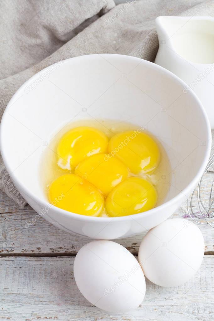 eggs and egg yolks close-up